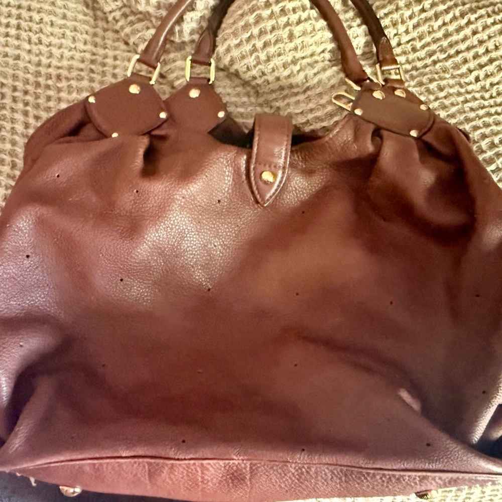 Authentic Gentle Used Mahina Louis Vuitton leather bag